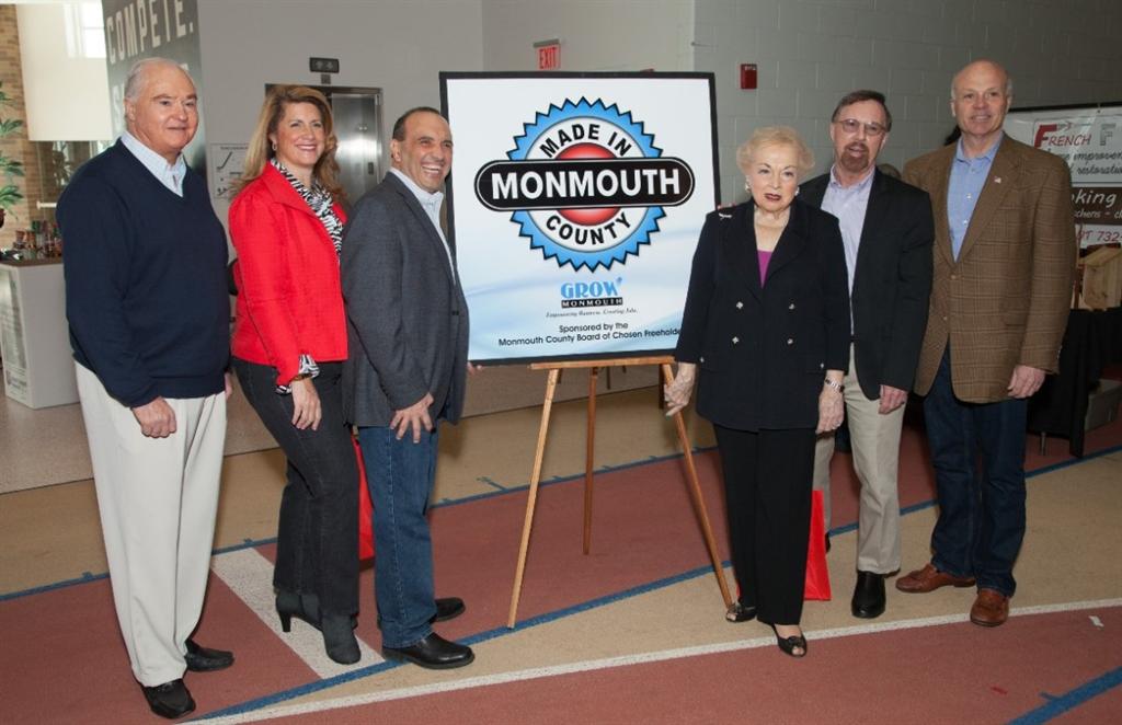 The Monmouth County Board of Chosen Freeholders join Monmouth University president Dr. Paul Brown to welcome vendors and shoppers to the 2015 Made in Monmouth expo on April 11 at Monmouth University in West Long Branch, NJ. Pictured left to right: Freeholder John P. Curley, Freeholder Deputy Director Serena DiMaso, Freeholder Thomas A. Arnone, Freeholder Lillian G. Burry, Dr. Paul Brown and Freeholder Director Gary J. Rich, Sr.